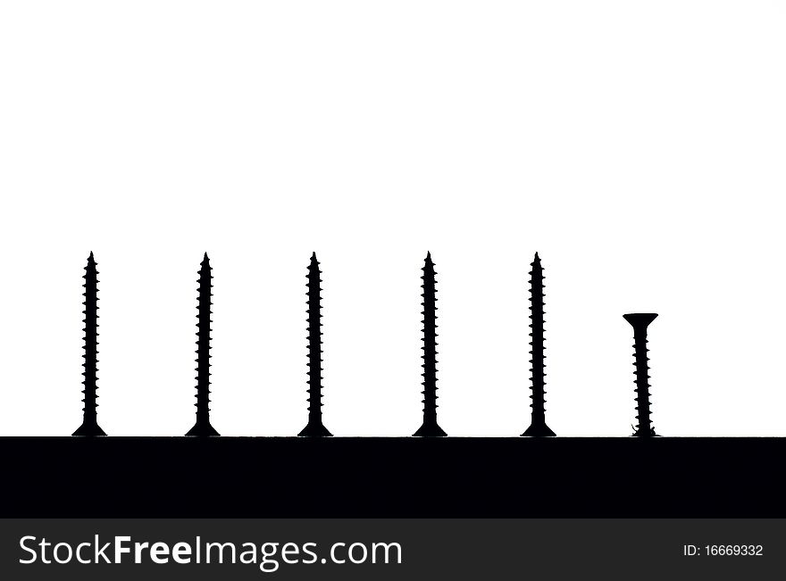 Silhouette of screws on a white background