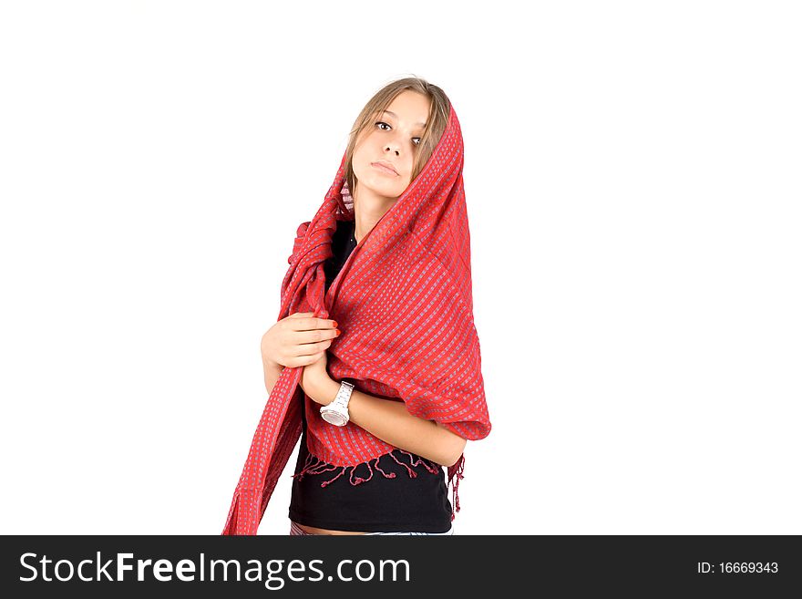 Girl in warm head scarf posing in studio