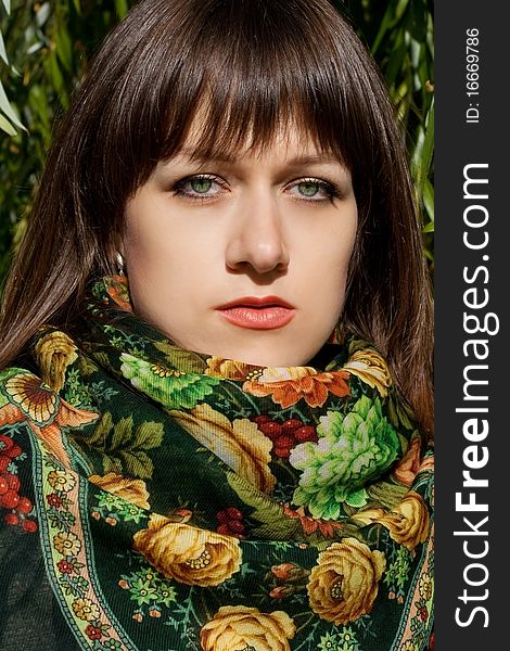 Portrait of beauty young woman with leaves of the tree. Portrait of beauty young woman with leaves of the tree