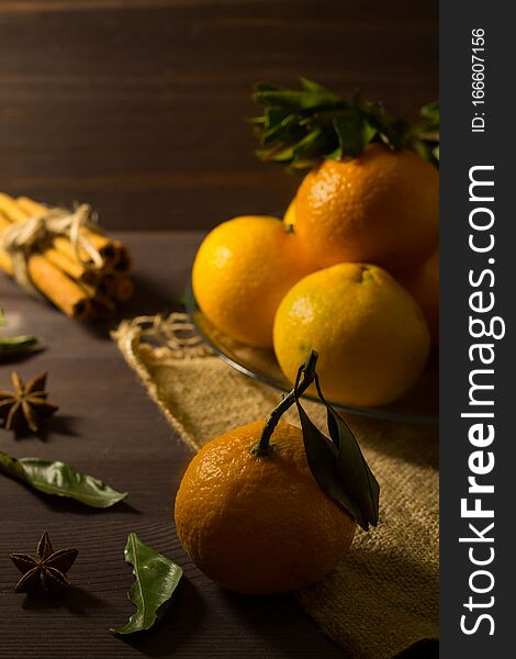 Fresh tangerines on wooden table