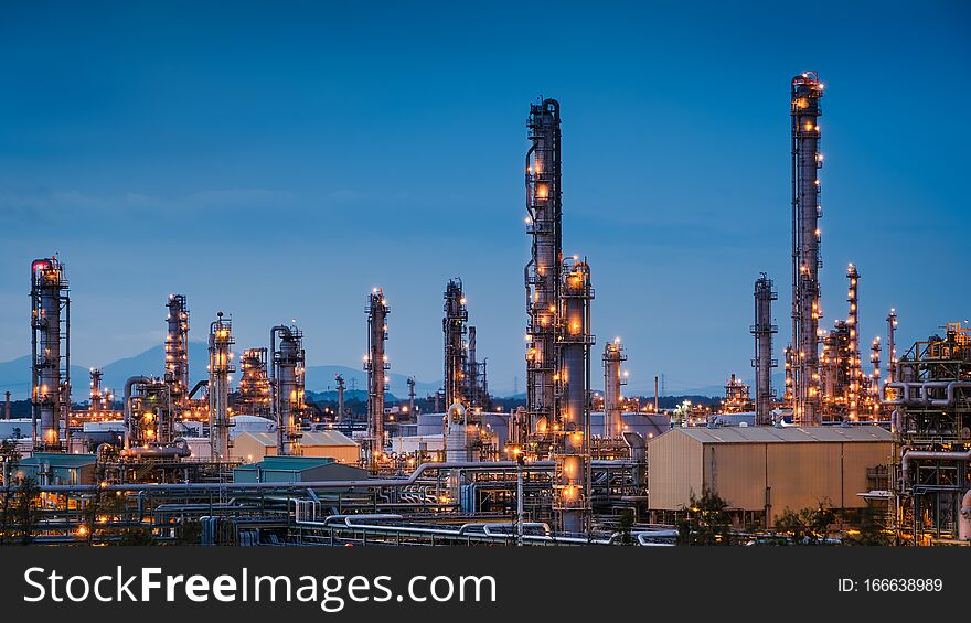 Oil and gas refinery plant or petrochemical industry on blue sky twilight background, Manufacturing petroleum industrial. Oil and gas refinery plant or petrochemical industry on blue sky twilight background, Manufacturing petroleum industrial
