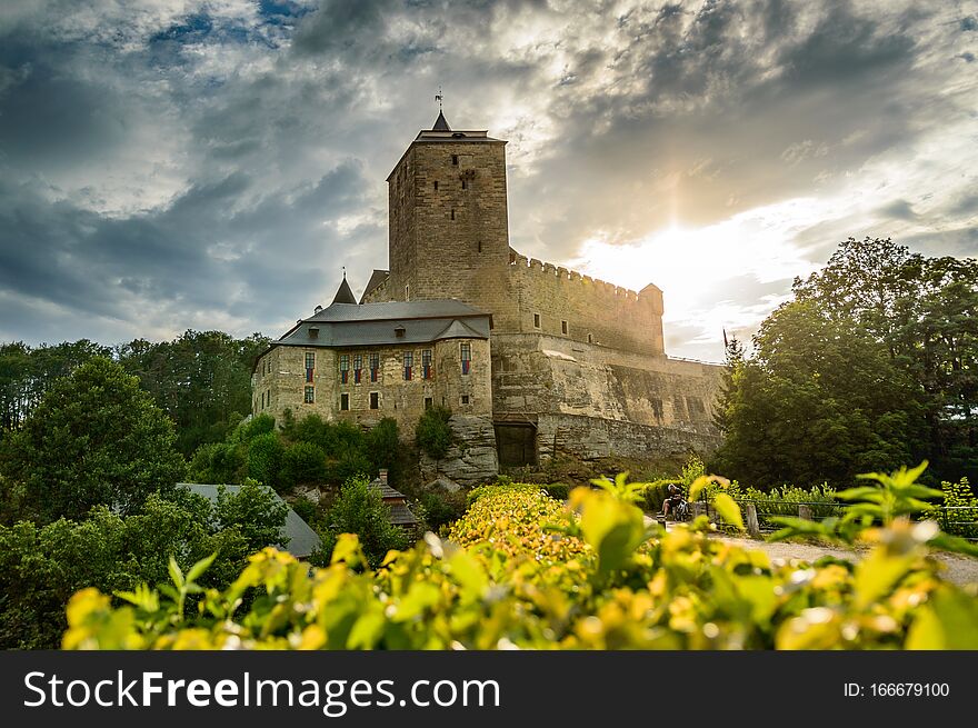 View Of The Kost Castle On The Hill At Sunset