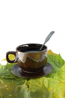 Still-life From A Cup Of Tea And Yellow Autumn Lea Stock Photos Still-life From A Cup Of Tea And Yellow Autumn Lea Stock Photos