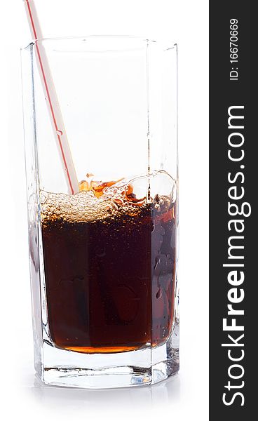 Soda in a glass, a white background