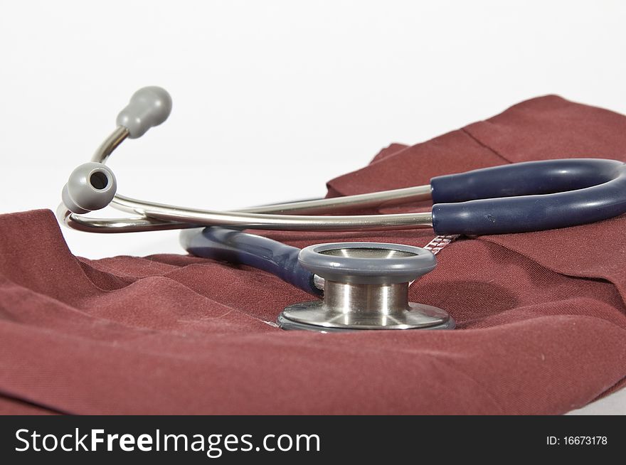 This image shows a stethoscope on a gown