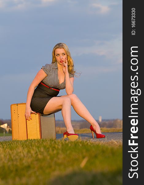 Young woman traveling in the country side. Young woman traveling in the country side