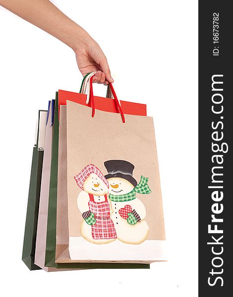 Holding Christmas bags, isolated on white. Holding Christmas bags, isolated on white