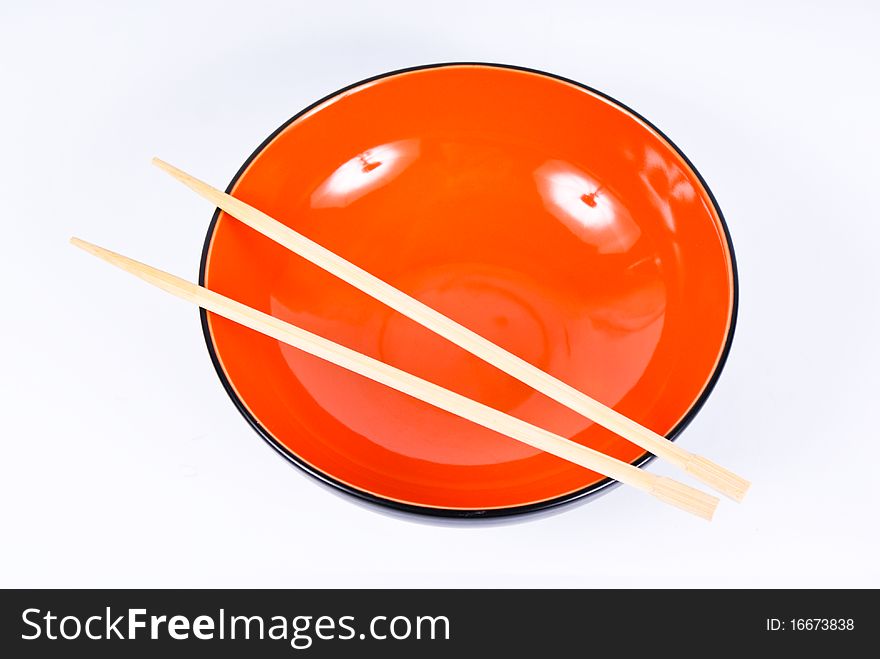 Orange Dish With Sticks