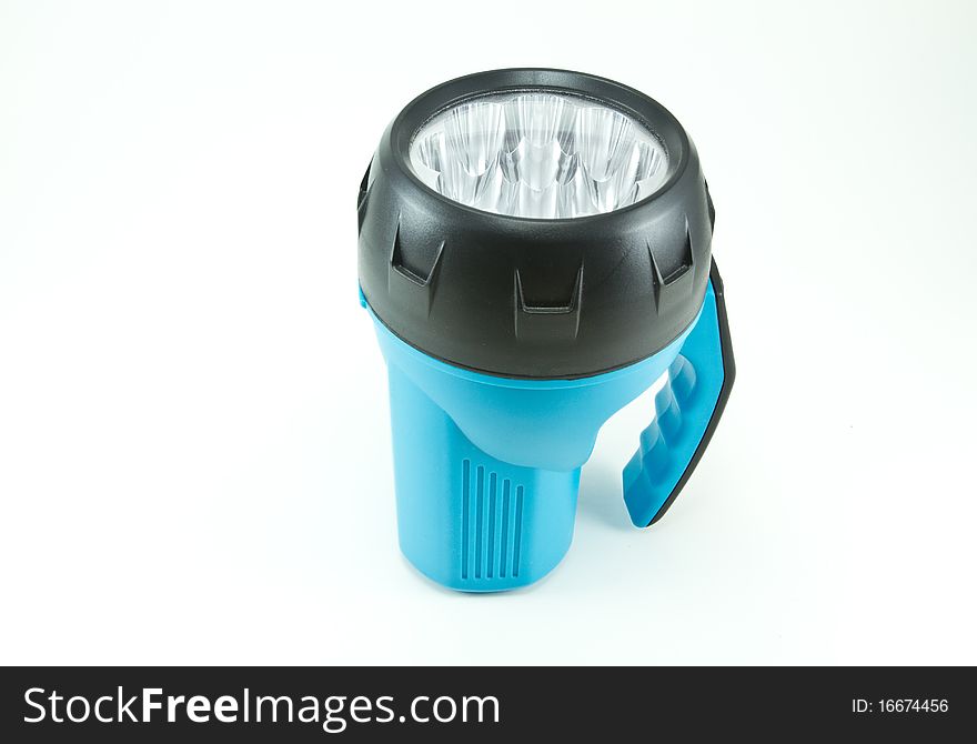 Blue flashlight on a white background