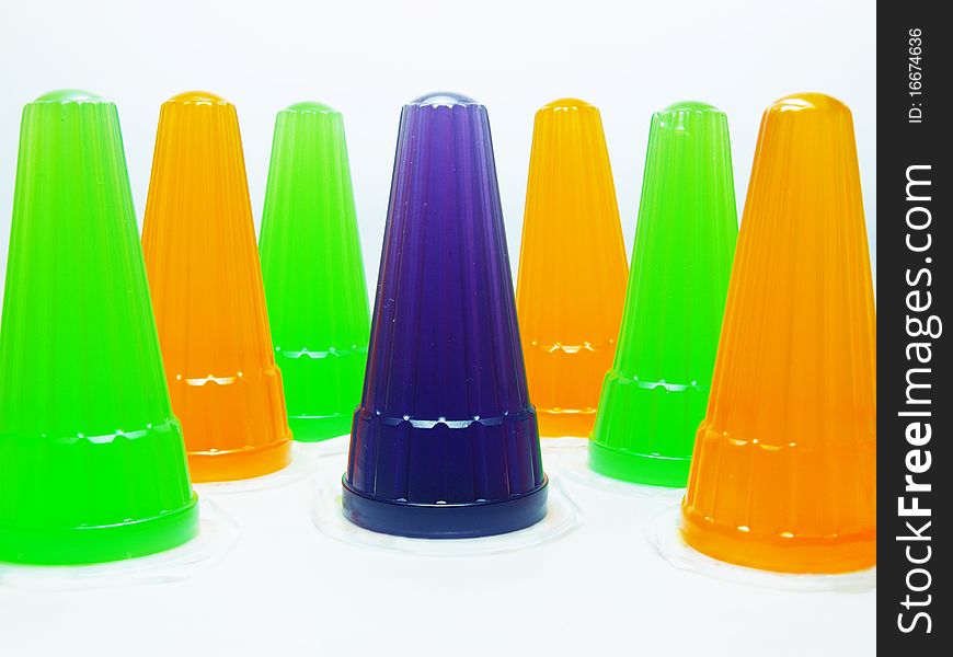 Colorful sweet jelly line up on a white background.