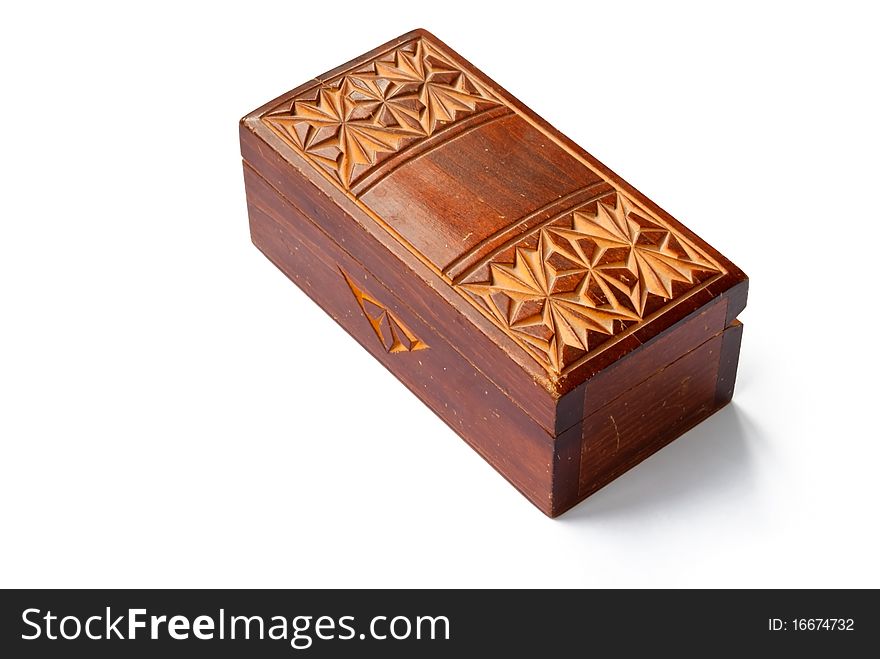 An old vintage wooden box with carved patterns