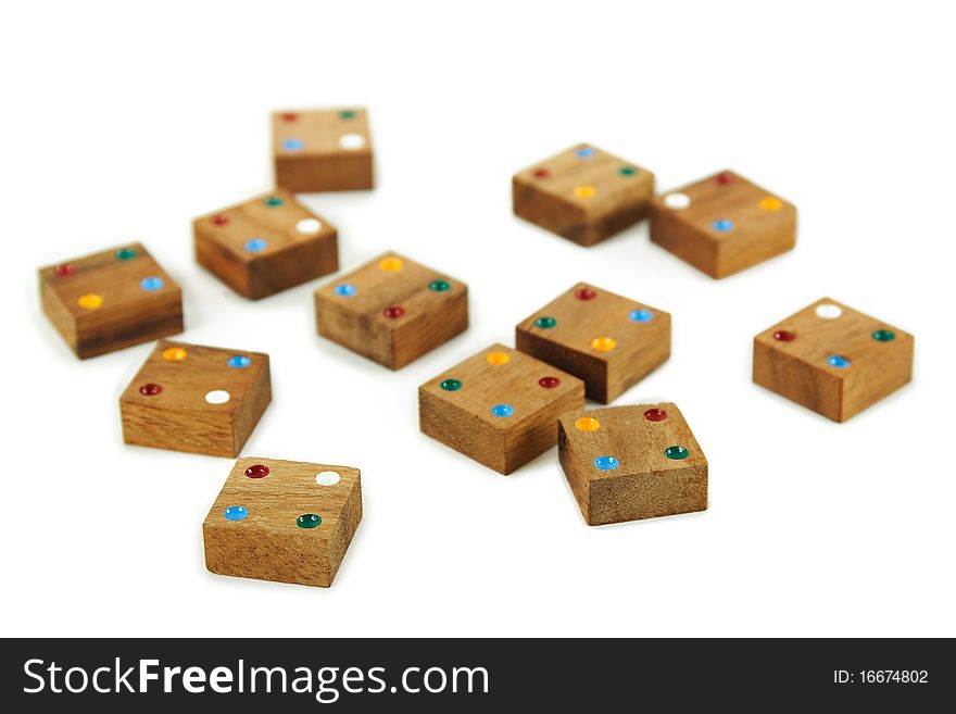 Wooden square figures isolated on white on white
