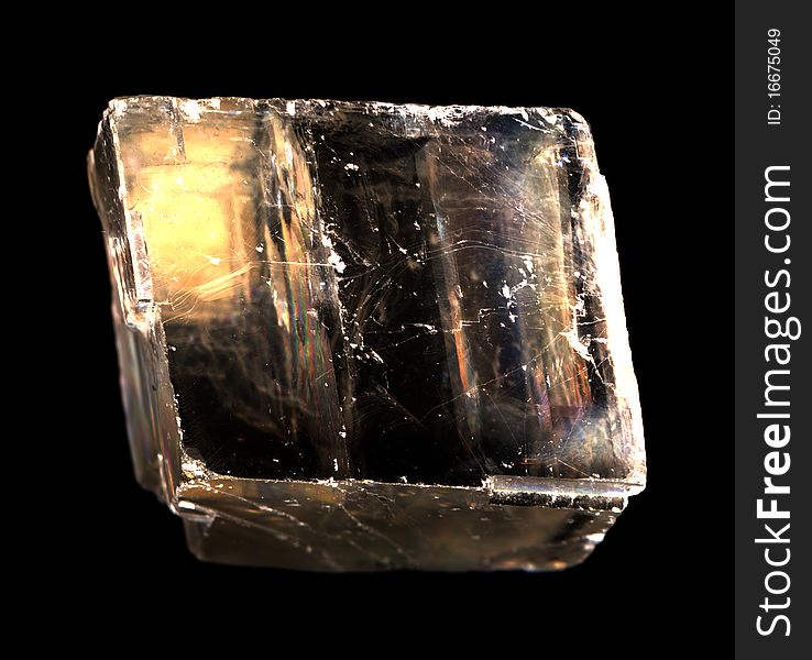 Mineral iceland spar isolated on the black background