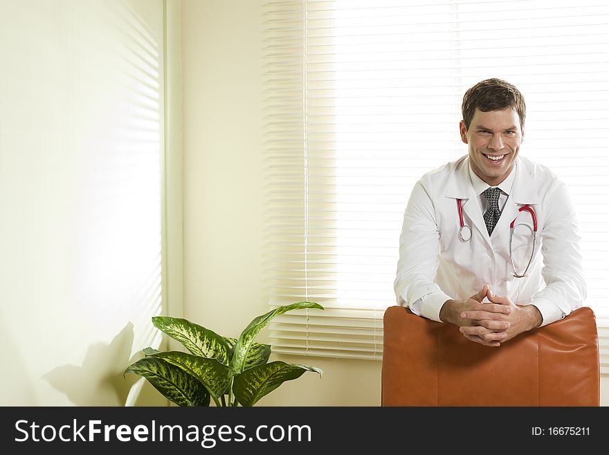 Portrait of a male doctor in his studio