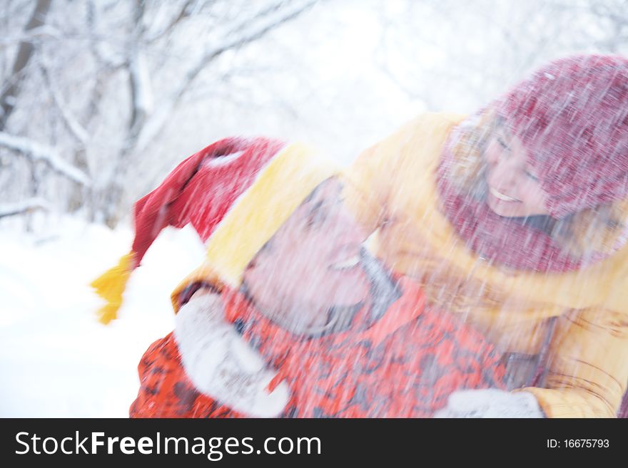 Couple Playing On Snow