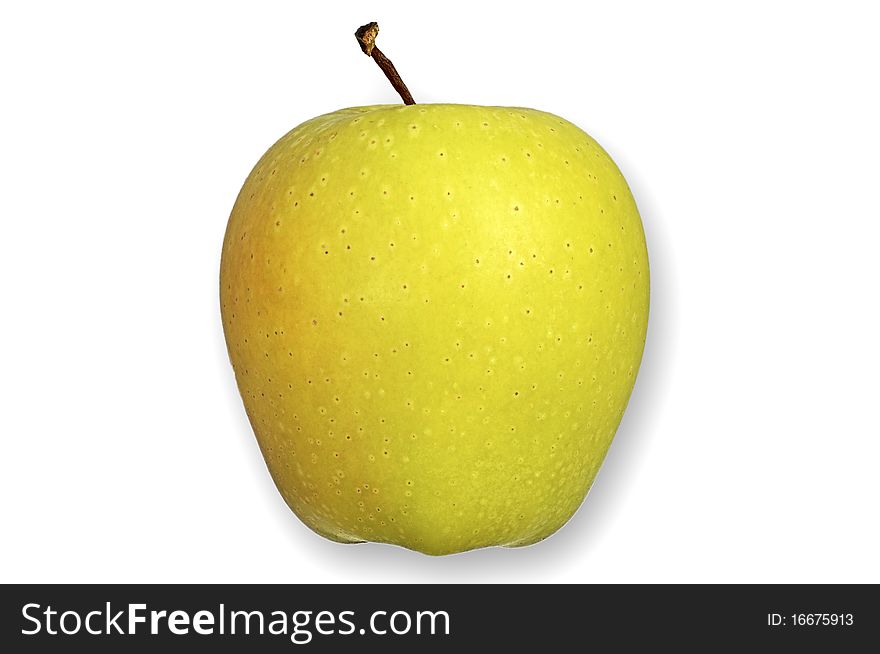 Tasty fresh yellow apple isolated over white background