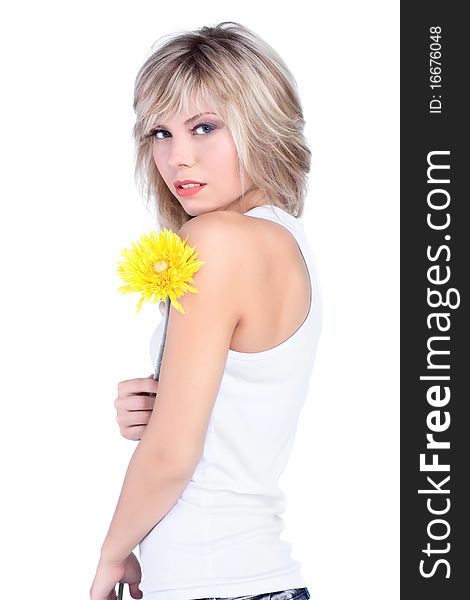 Young girl over white background with flower. Young girl over white background with flower