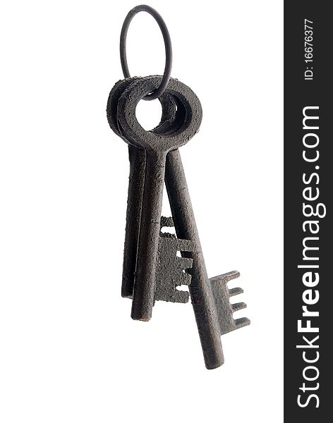 Three old fashinoed keys on a ring isolated. Red highlight