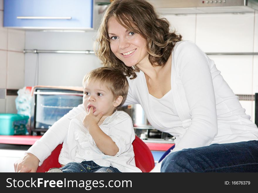 Young mother and son at home