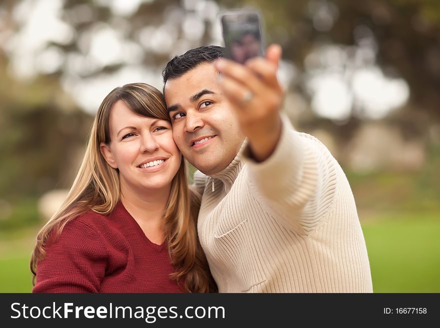 Attractive Mixed Race Couple Taking Self Portraits