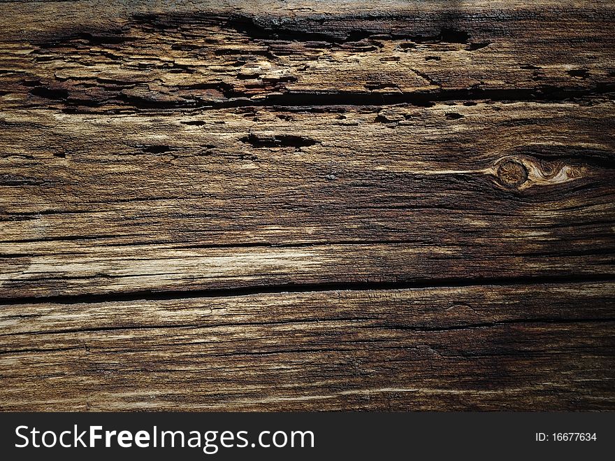 Touchwood background with bough and cracks