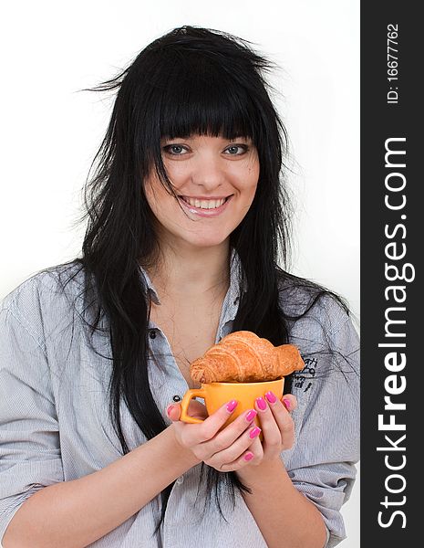 Cute girl with cup and croissant in shirt isolated on white