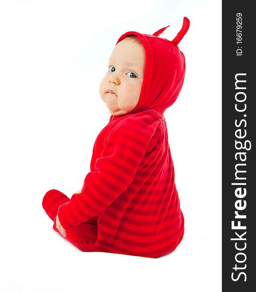 I'm a little devil! Cute half-year-old boy in costumes