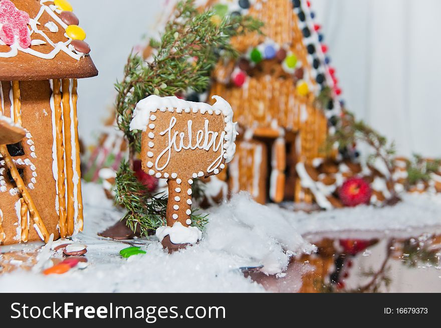 Christmas tale. Gingerbread houses at the table