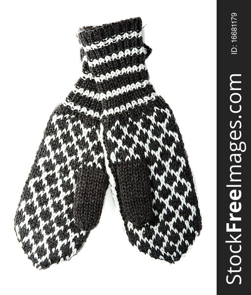 Knitted winter mittens with pattern on white background