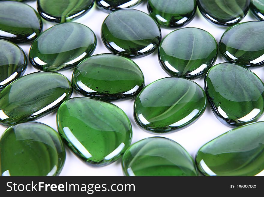 Green decorative stones in close up - background