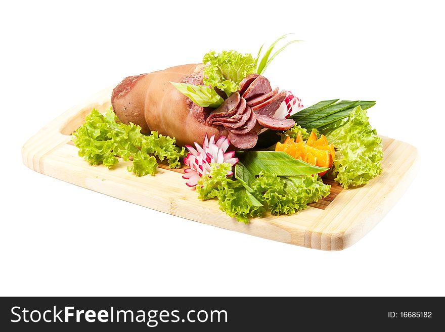 Bavarian roasted knuckle of pork with vegetables on white background