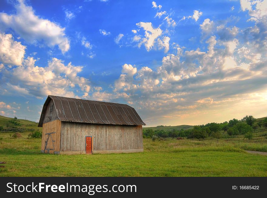 Autumn landscape with an isolated hut on sunset. Autumn landscape with an isolated hut on sunset