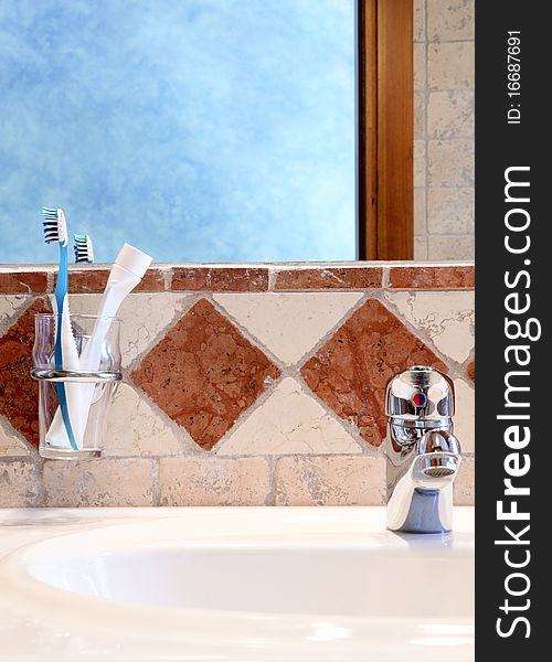 Detail of classic bathroom interior with personal dental hygiene tools