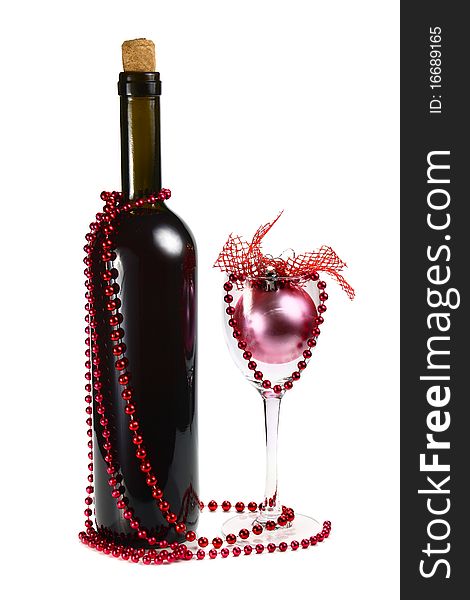 Bottle with red wine and decoration for christmas isolated on white background