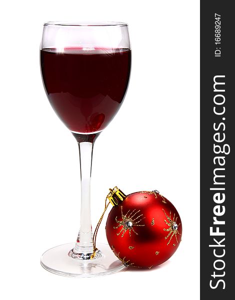 Glass of red wine and decoration for ï¿½hristmas isolated on white background