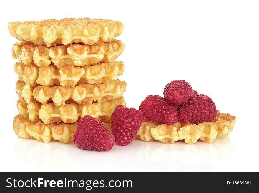 Waffle stack with fresh raspberries, isolated over white background. Waffle stack with fresh raspberries, isolated over white background.