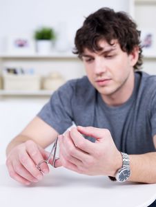 Free Cutting Nails On The Female Hands Stock Photos - 16690033