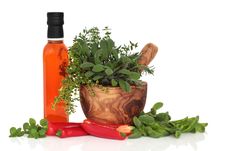 Chillies, Oil And Herb Leaves Royalty Free Stock Photography Chillies, Oil And Herb Leaves Royalty Free Stock Photography