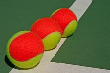 Three Balls On A Green Court Stock Images Three Balls On A Green Court Stock Images