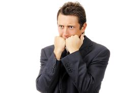 Young Businessman Is Afraid. Isolated On White Royalty Free Stock Photos Young Businessman Is Afraid. Isolated On White Royalty Free Stock Photos