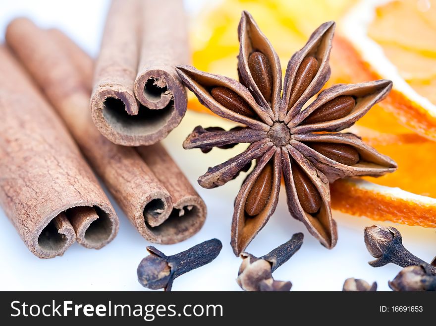 Star Anise, cinnamon sticks, cloves and orange slices for Christmas baking. Star Anise, cinnamon sticks, cloves and orange slices for Christmas baking