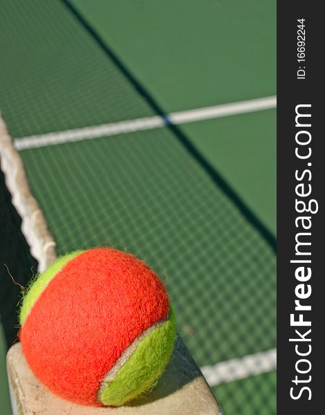 Tennis Ball And Shadow Net