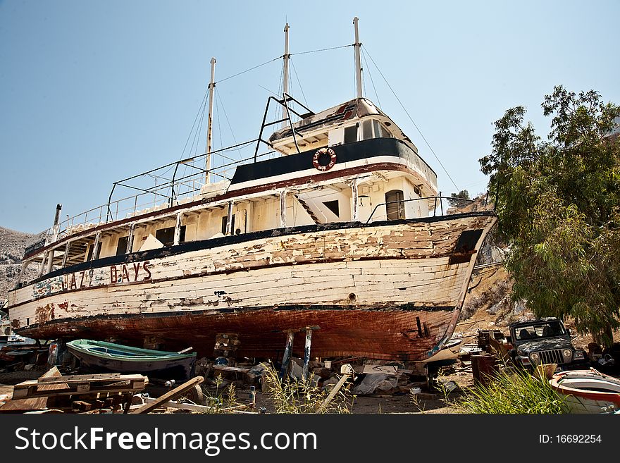 Old boat on a cemetery of the ships