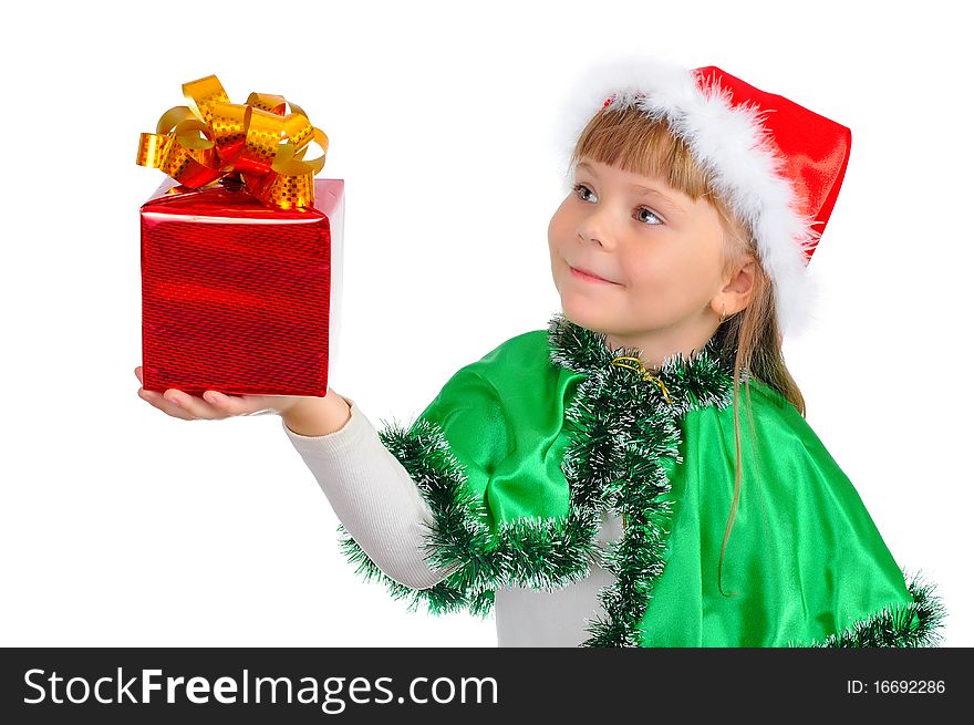 The girl in a Xmas suit with a gift in a hand isolated on white