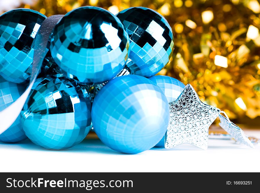 Colorful Christmas baubles and silver stars