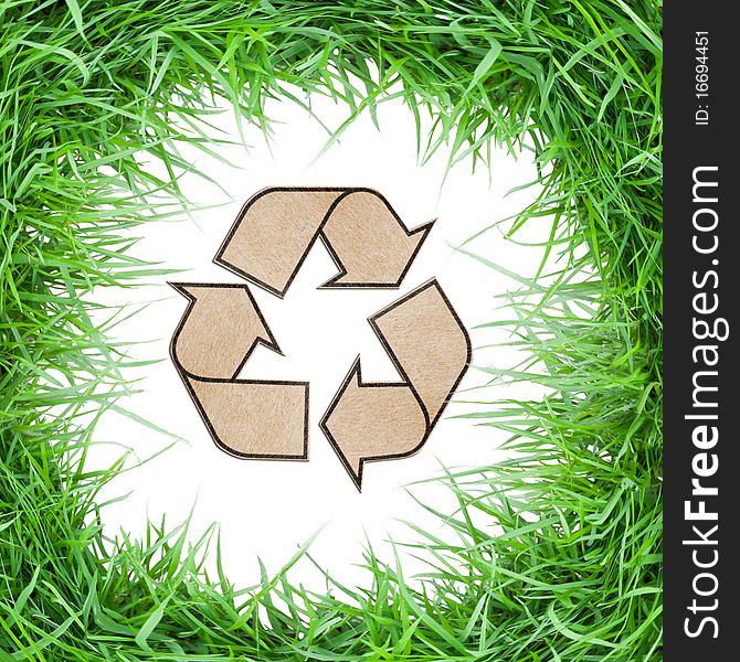 ISOLATED GREEN GRASS RECYCLE SYMBOL
