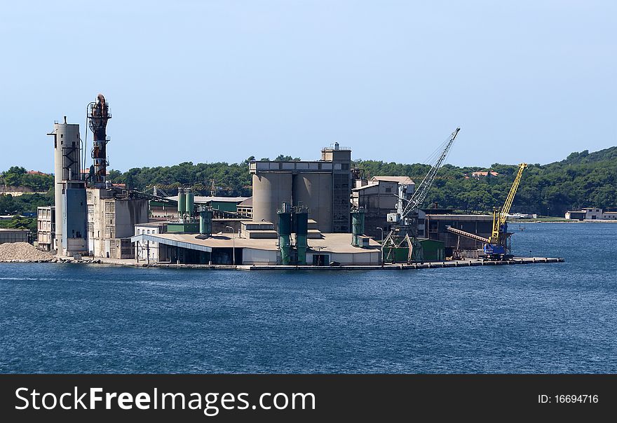 Marine cargo port. Cranes. Pula, Croatia