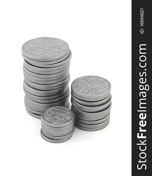 Silver play money isolated against a white background