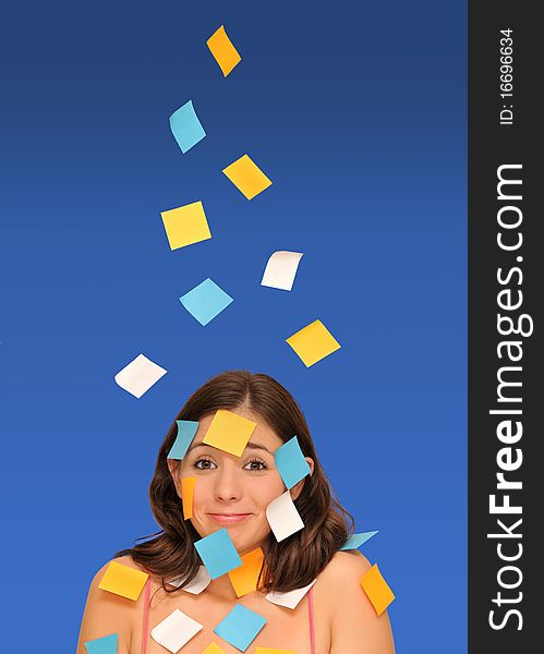 Beautiful woman ans sticky notes isolated over blue