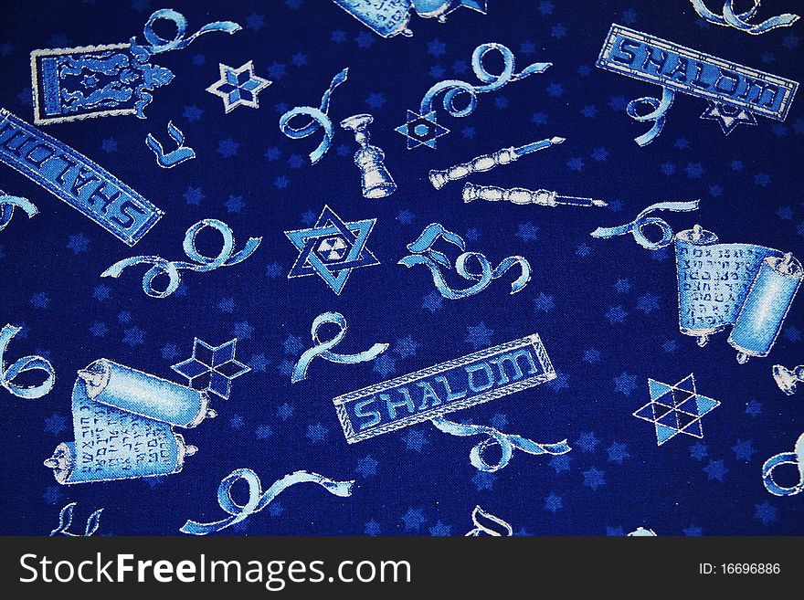 Shows Shalom pattern on dark blue cloth by the yard. Shows Shalom pattern on dark blue cloth by the yard.